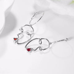 Ruby Stone And Smile Kiss Drop Earrings